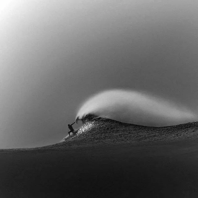 man surfing a perfect offshore wave at vultun siargao