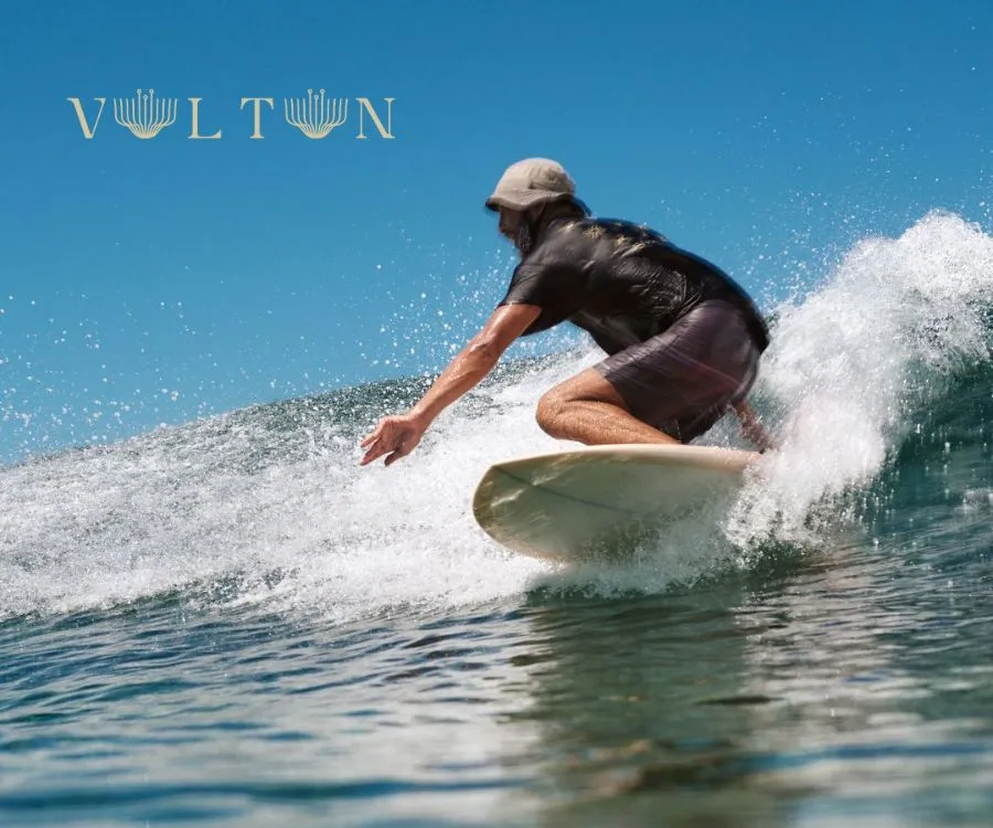 Vultun surfer at Rock Island reef break near Siargao — guided surf adventure