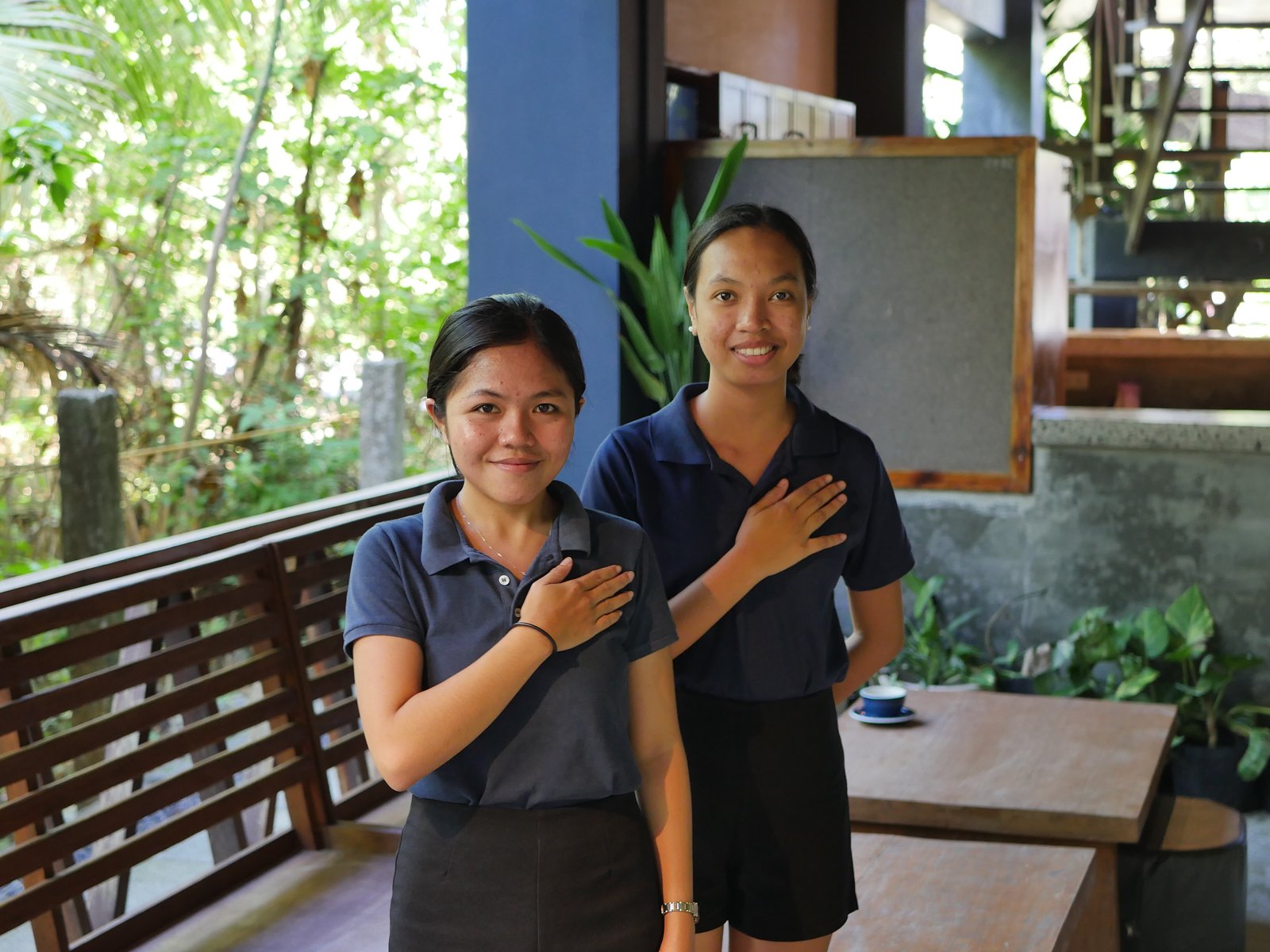 Vultun Wellness Cafe team welcoming guests at the SOS Gym Malinao common area, Siargao