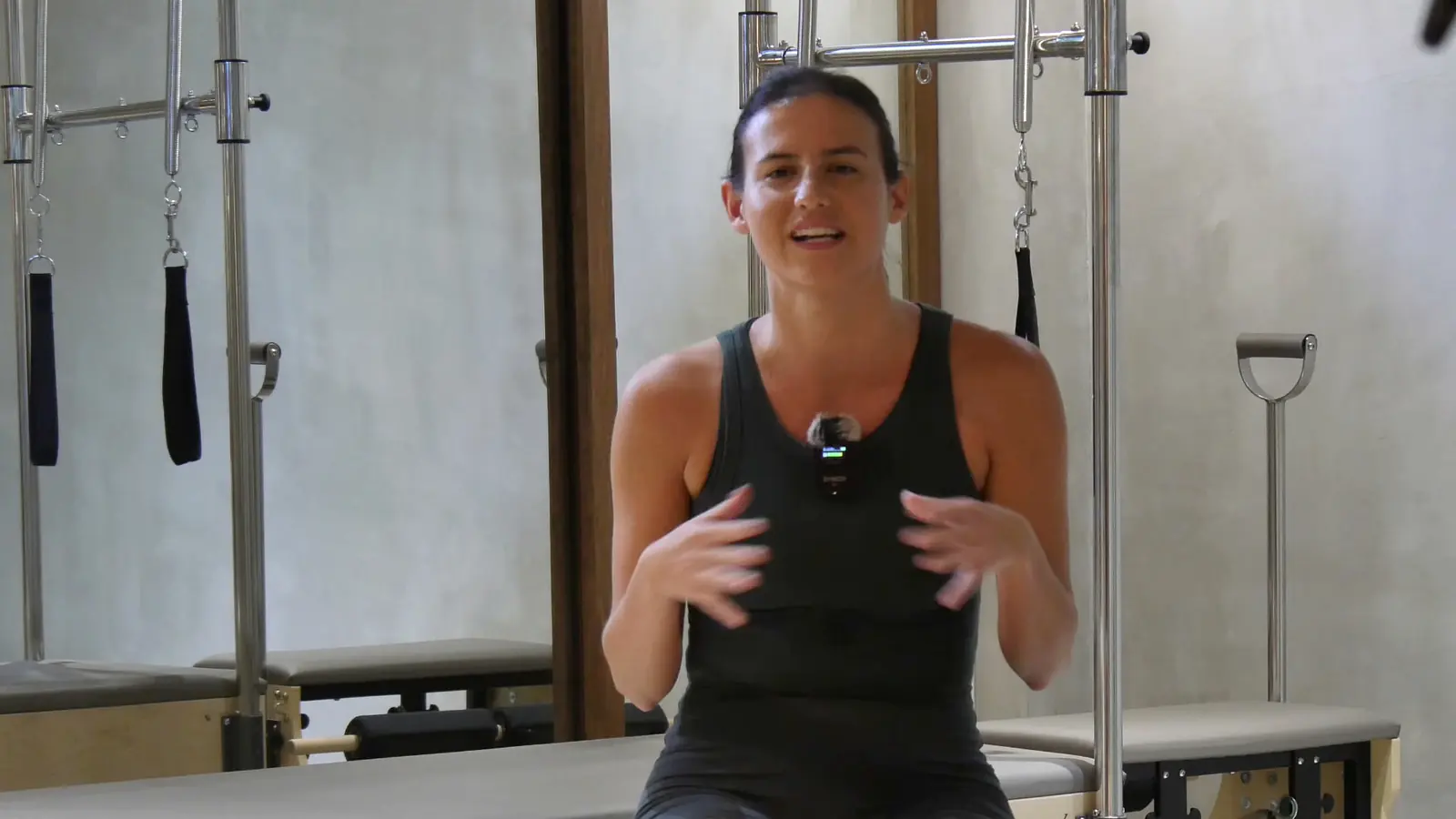 Rianna speaking in the Feral Pilates reformer studio in Siargao