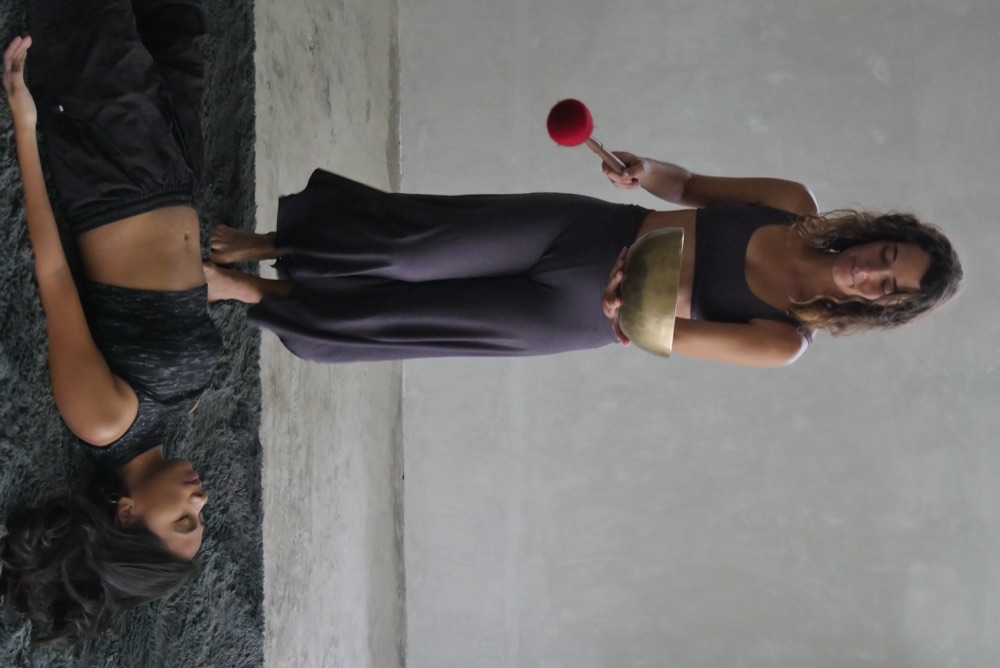 Tibetan singing bowl closeup during sound healing at Holding Space by Vultun